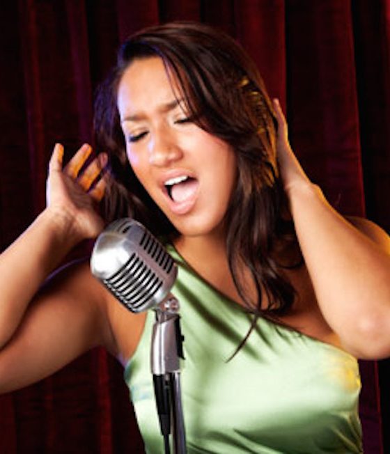 Woman-Singing-into-retro-microphone460x300